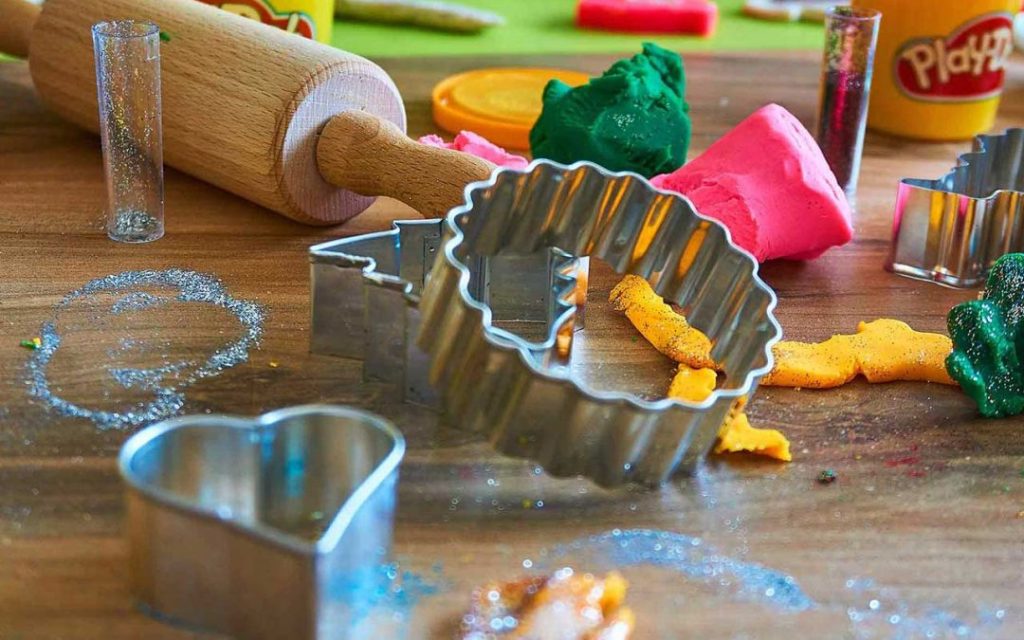 Colorful play-doh set used in child-centered play therapy